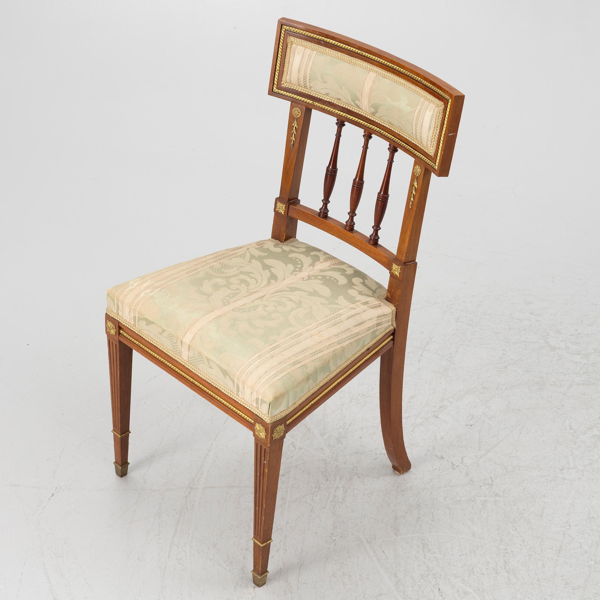A sofa, two armchairs, four chairs and table, Empire style, 20th century.