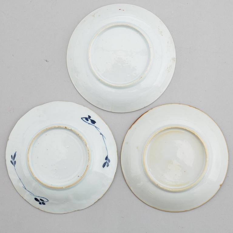 A famille rose butter tureen with cover and two cups with three odd stands, Qing dynasty, Qianlong (1736-95).