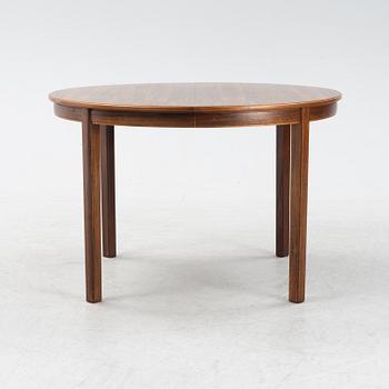 A 1960's/70's rosewood veneered dining group.