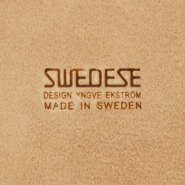 Yngve Ekström, A pair of armchairs, a footstool, “Lamino”, and a side table, Swedese, 2000s.