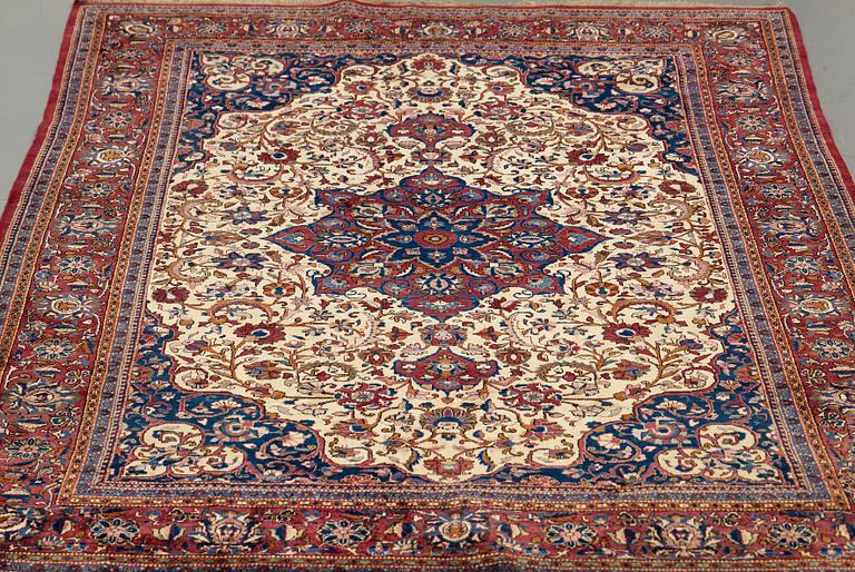 A RUG, semi-antique silk Kashan, ca 200 x 129 cm.