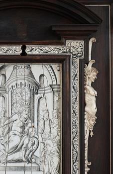 An Italien Baroque-style 19th century cabinet on stand.