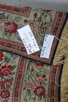 A rug, silk Qum, ca 150 x 103 cm.