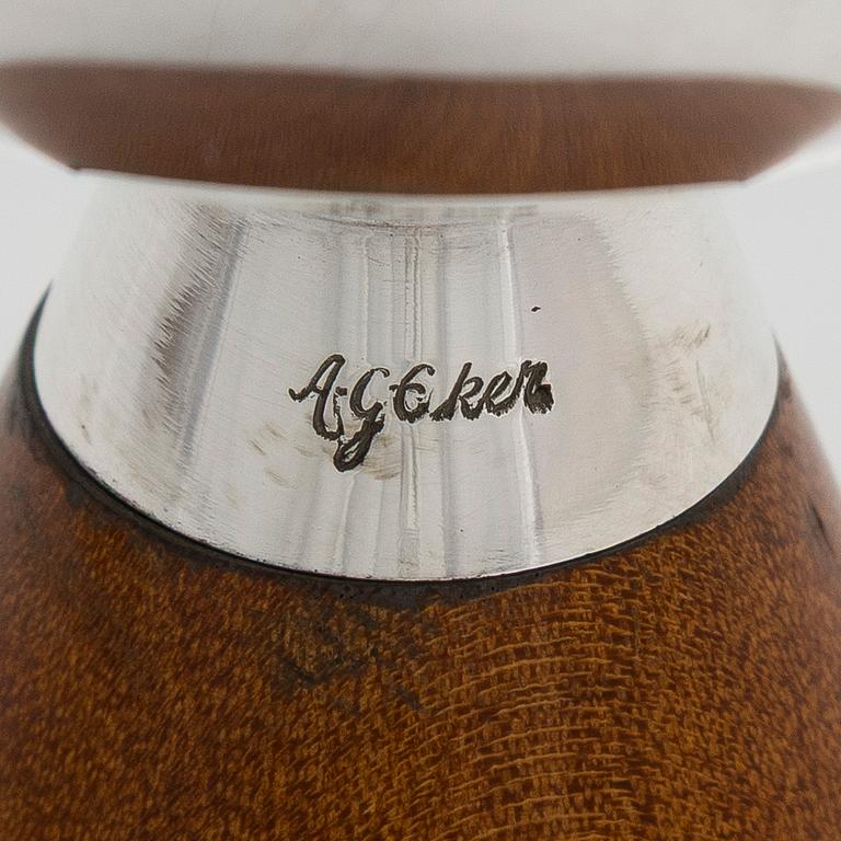Anna-Greta Eker, a silevr cream jug and sugar bowl on a mahogany base, Auran Kultaseppä, Turku 1962.