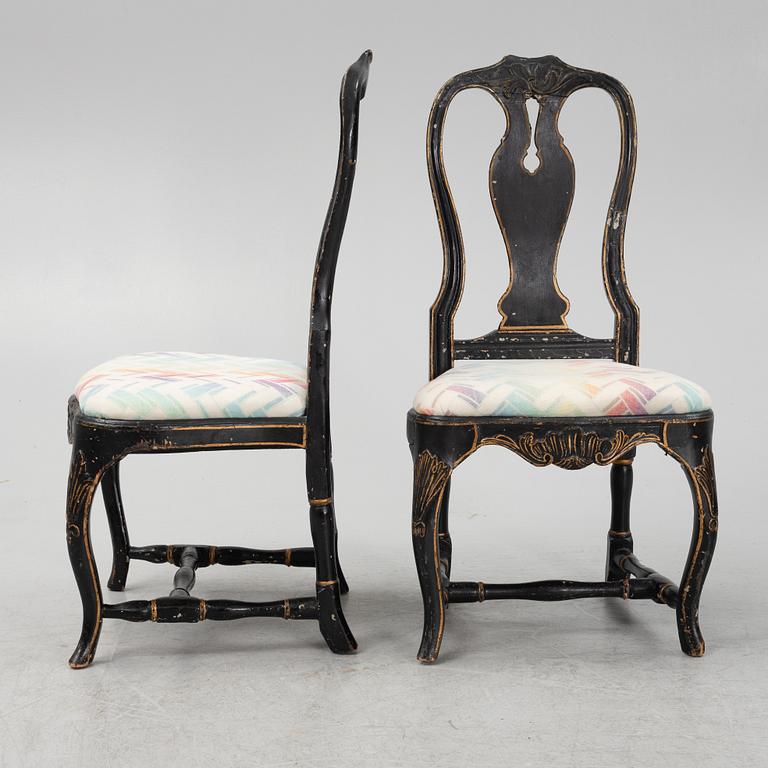 A pair of painted and carved Rococo chairs, second half of the 18th Century.