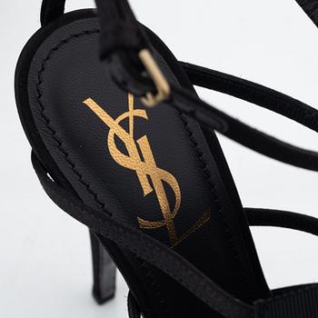 Yves Saint Laurent, a pair of black silk and bows platform sandals, size 37.