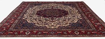 A semi-antique Isfahan carpet, Central Iran, c. 432 x 319 cm.