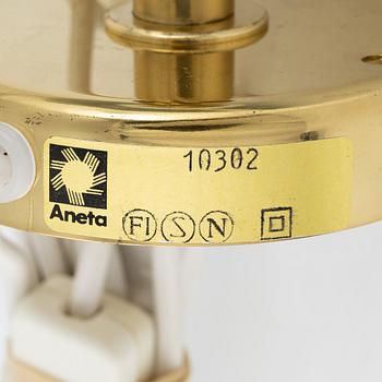 A pair of model 10302 brass wall lights, Aneta, Växjö.