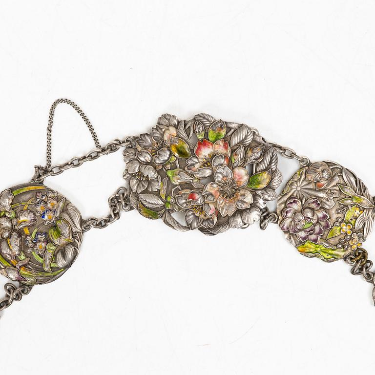 A Japanese Art Nouveau silver and enamel floral belt, by Sanju Saku, Meiji period (1868-1912).