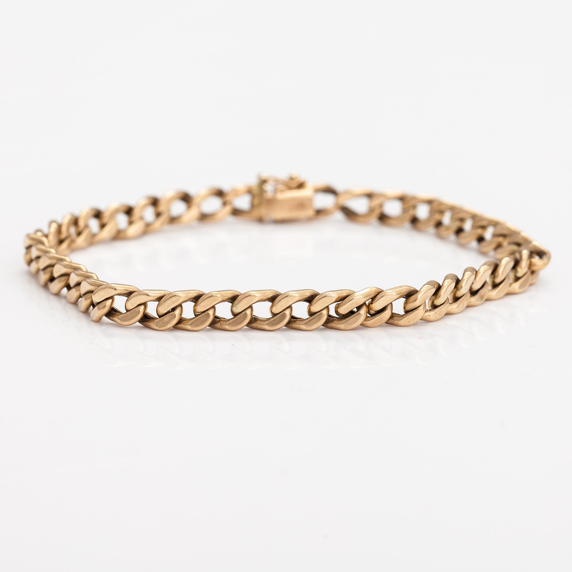 A 14K gold bracelet.