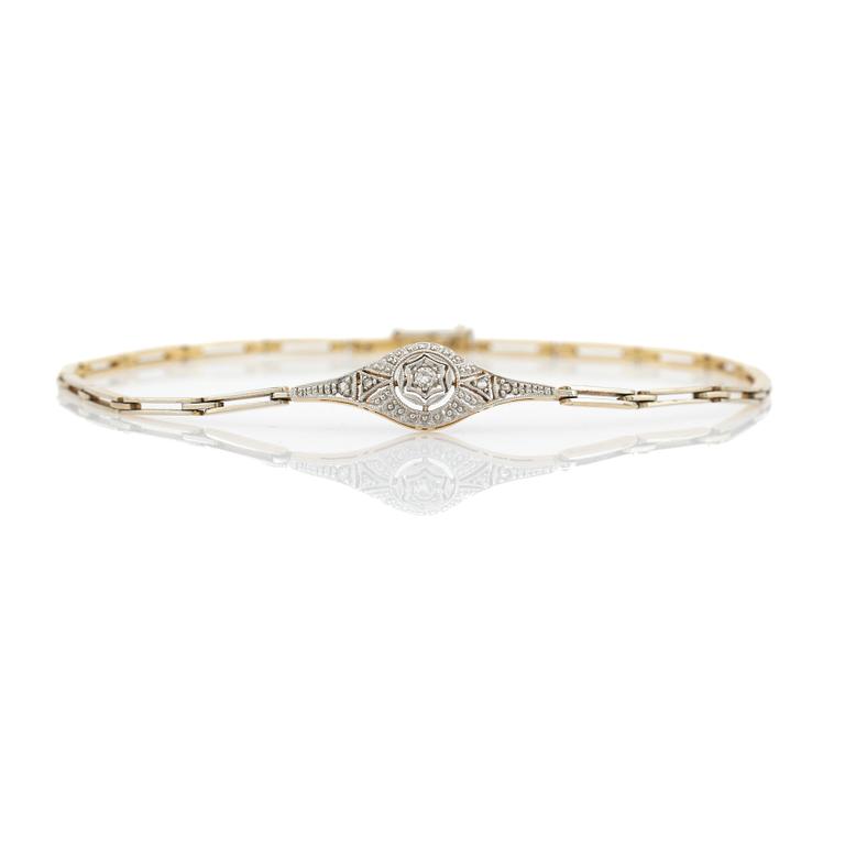 Bracelet, 18K gold with a centre piece set with diamonds.