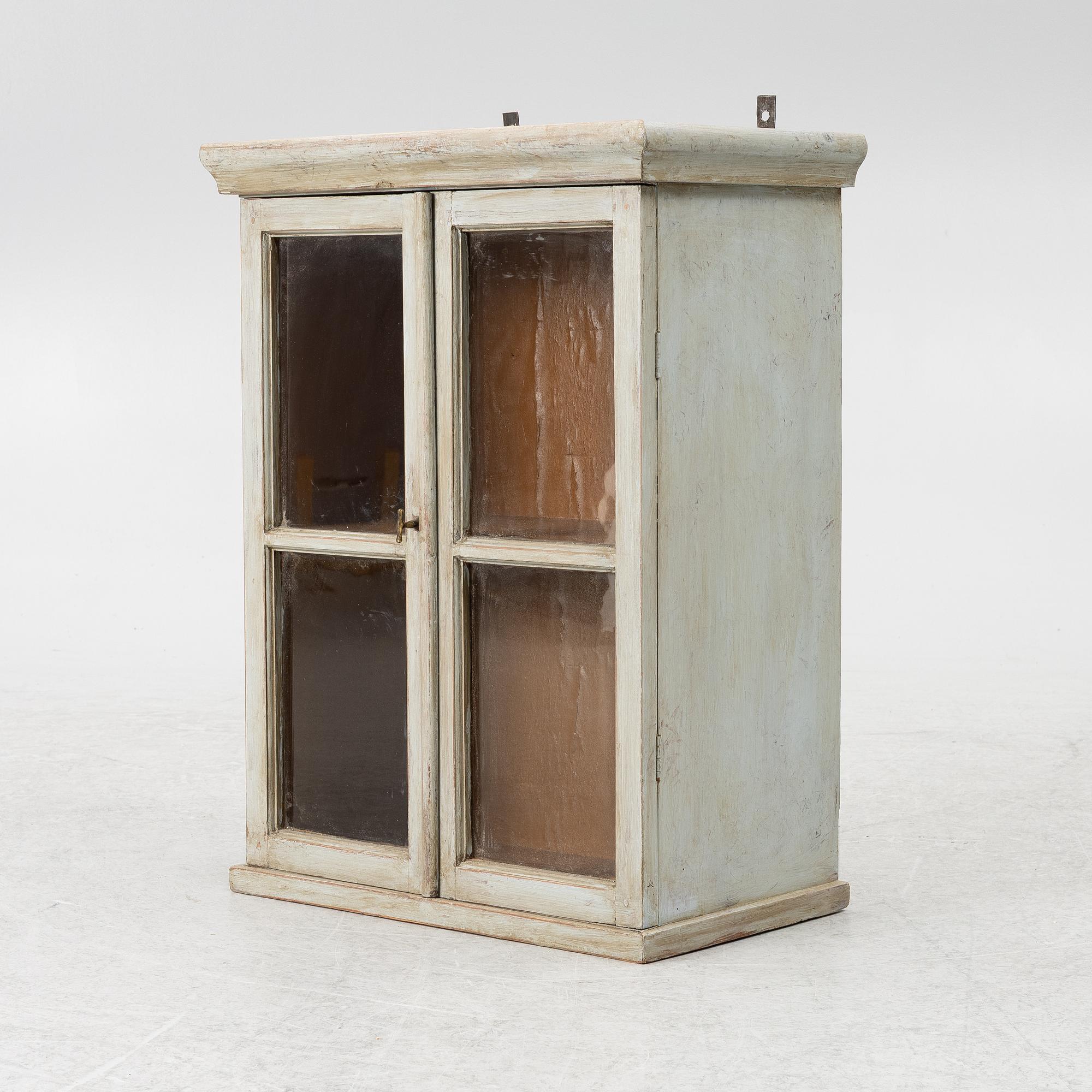 A wall cabinet, late 19th Century.