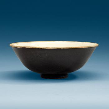 A brown and cream glazed bowl, presumably Song dynasty (960-1279).