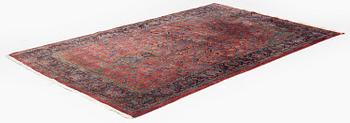 An antique Manchester Kashan rug, c. 197 x 126 cm.