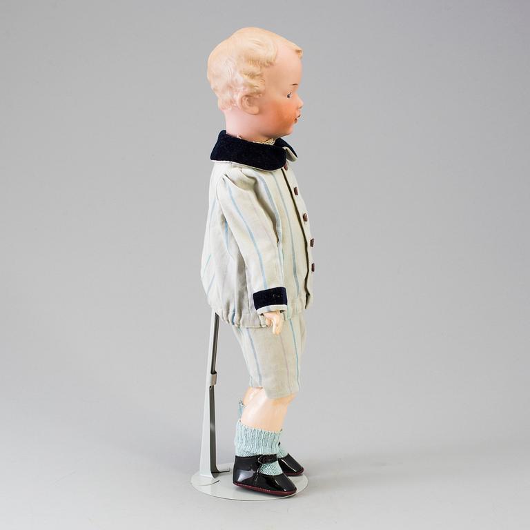 A bisque headed boy doll 7622 by Heubach, Germany, ca 1912.