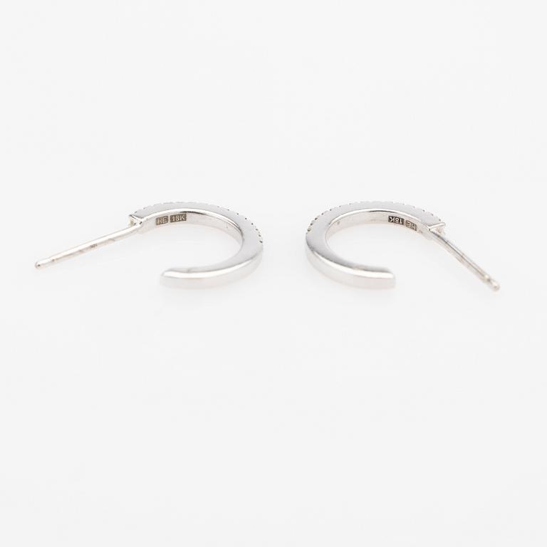 Earrings, a pair, with brown diamonds.