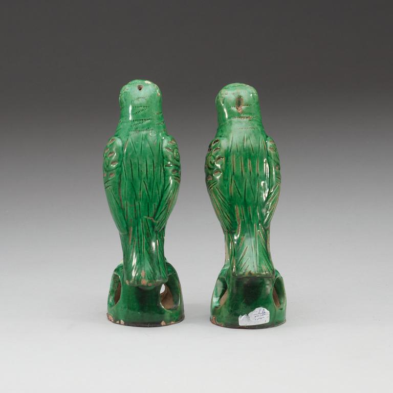 A set of two green glazed falcons, late Qing dynasty.
