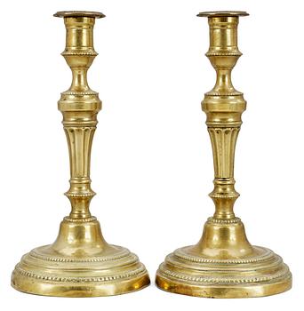 854. A pair of French Louis XVI candlesticks.