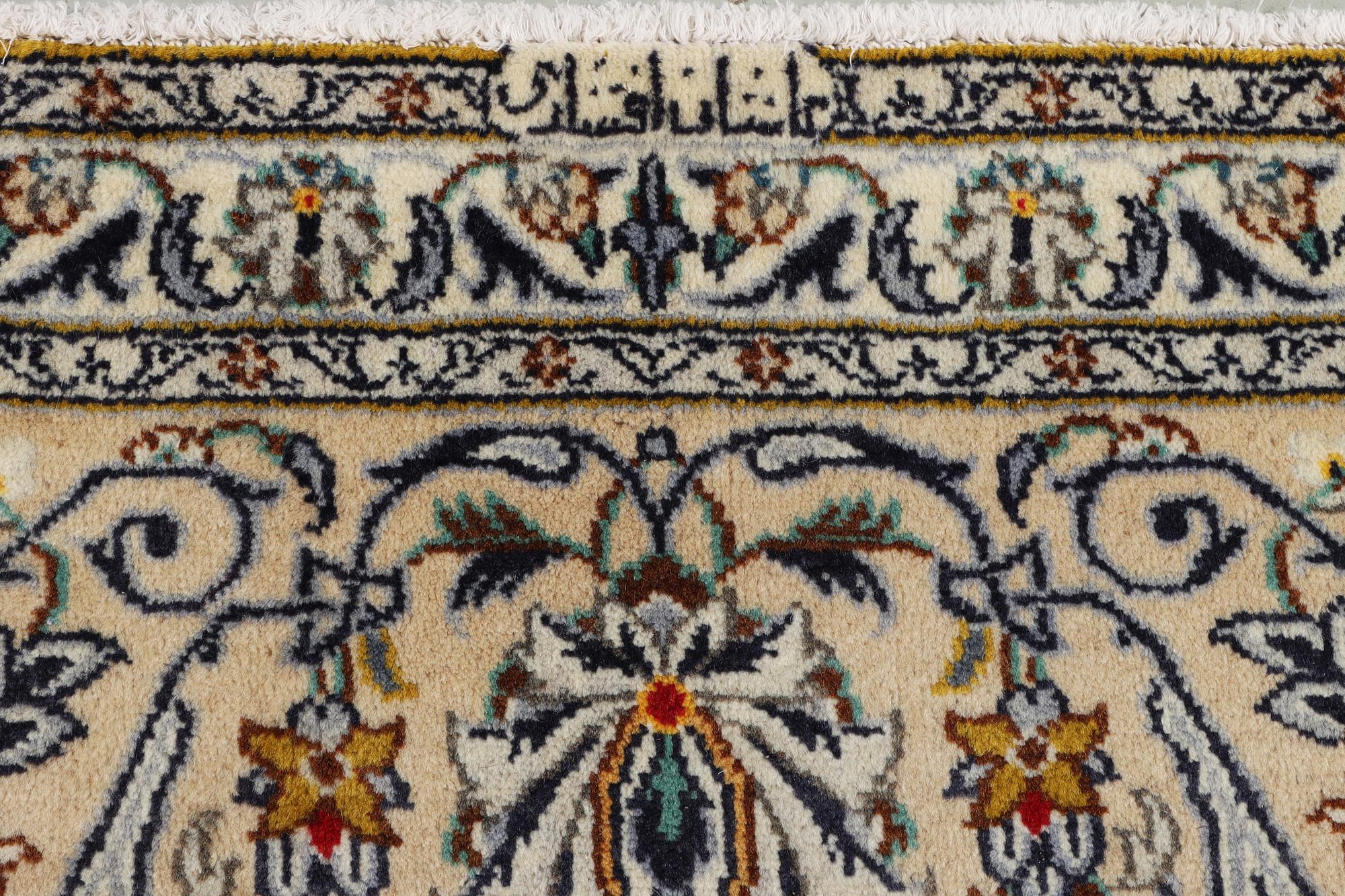A Kashan carpet, c. 387 x 290 cm.