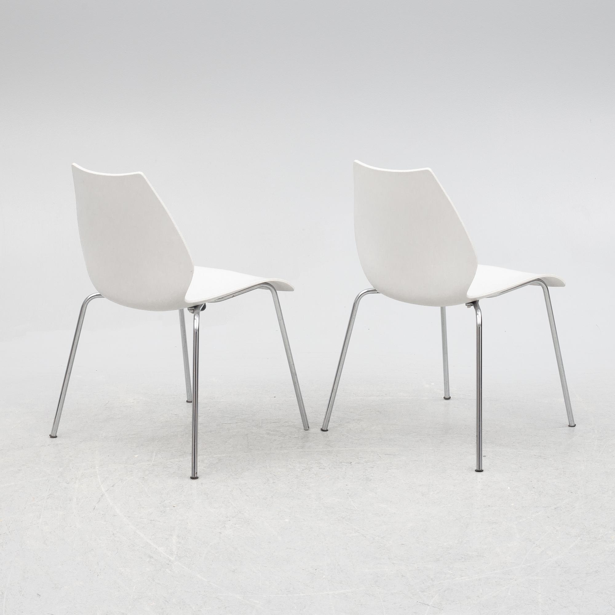 Vico Magistretti, twelve "Maui" chairs, Kartell.
