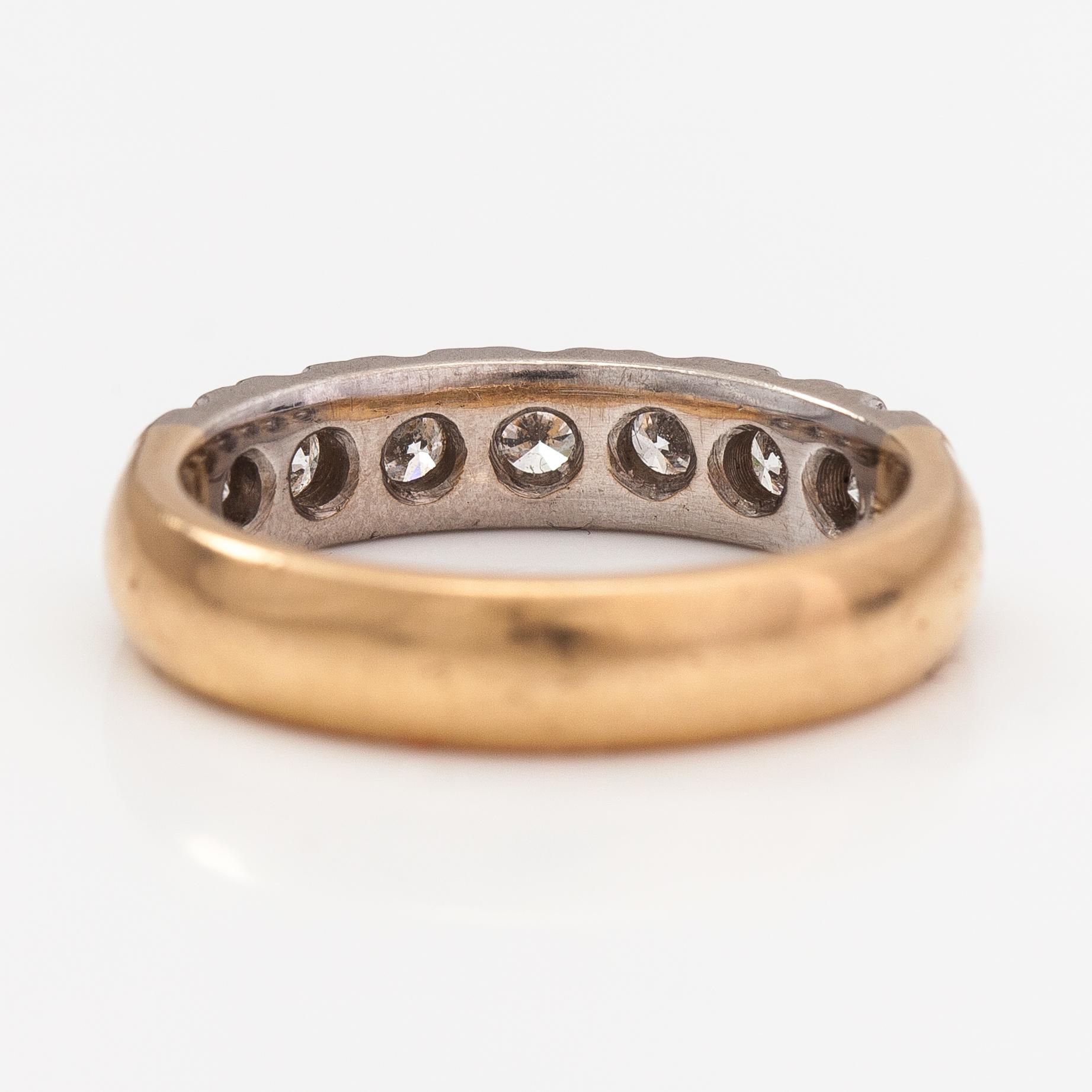 Sormus, 18K kultaa ja timantteja n. 0.57 ct yht. Helkelä Oy Kultasepänliike, Rauma 2004.