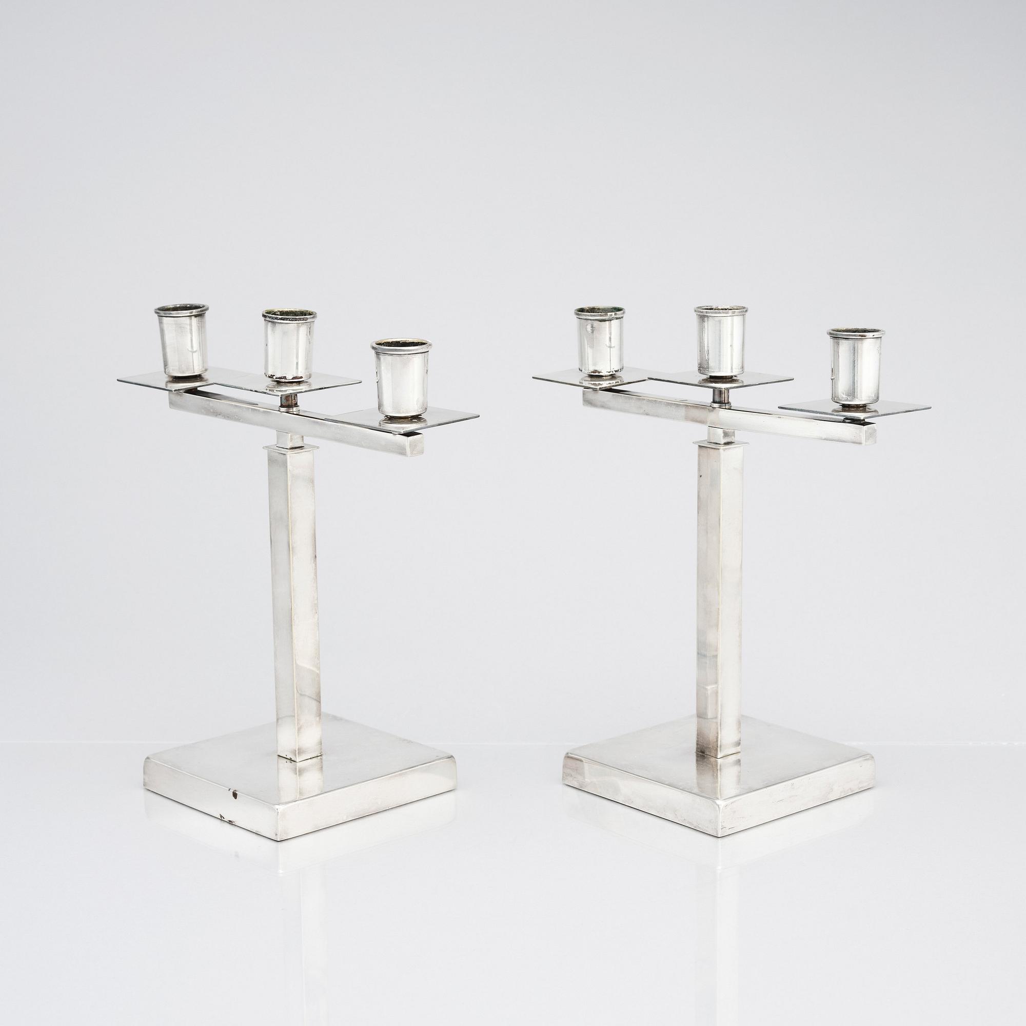 Rolf Engströmer, attributed to, a pair of silver plated candelabra, Fabriksaktiebolaget Kronsilver, Sweden 1930s.