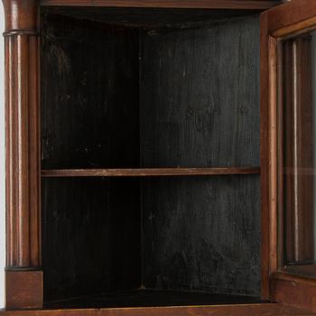 A mid-19th-century wall cabinet.