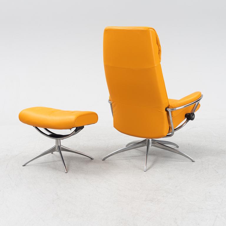 A 'London' stressless easy chair with foot stool, Norway.
