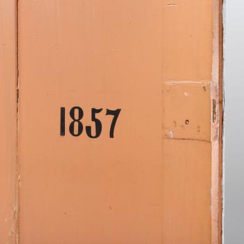 An 19th Century corner cabinet.