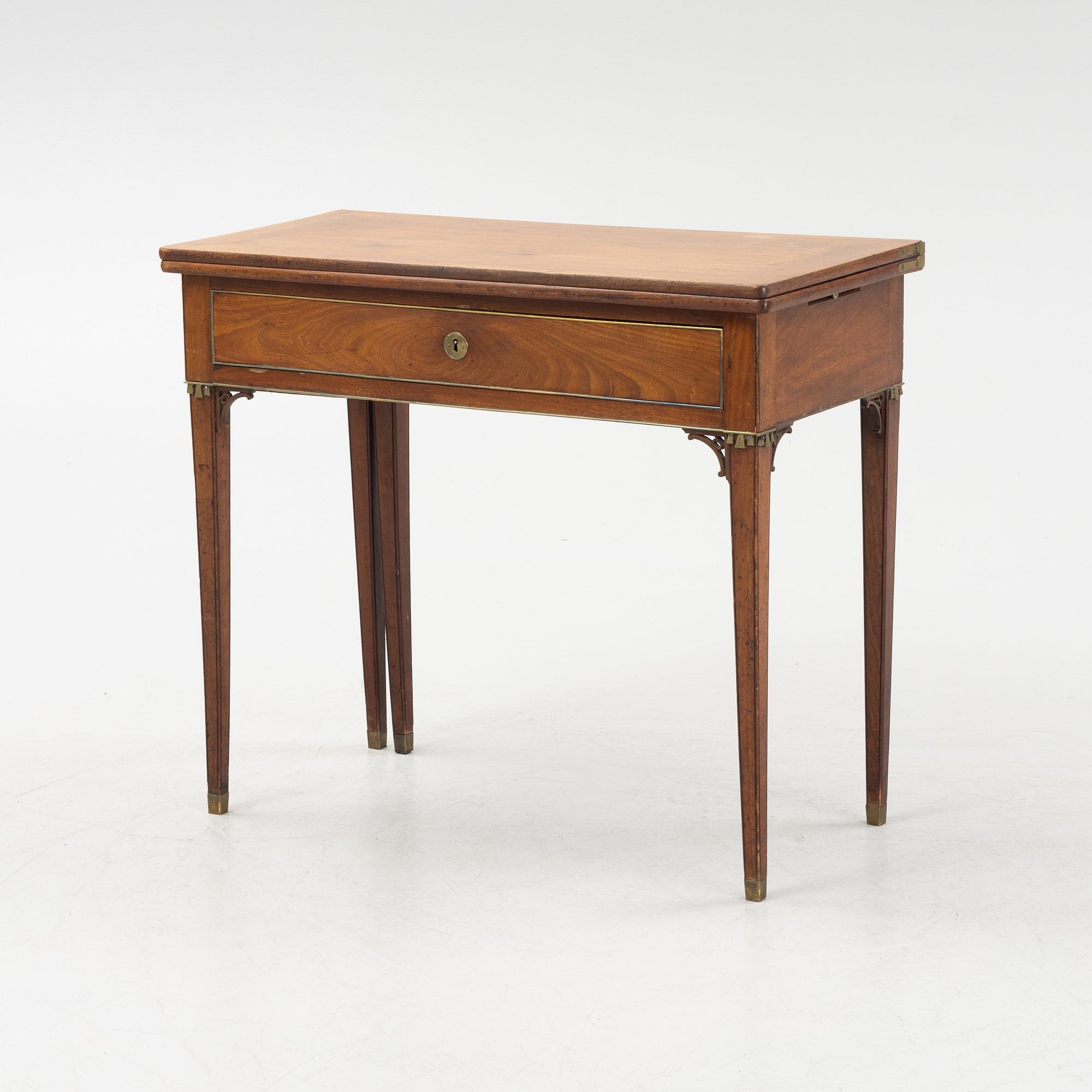 A late Gustavian mahogany card table from around the year 1800.