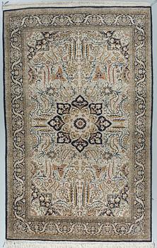 A silk Qum carpet, around  219 x 137 cm.