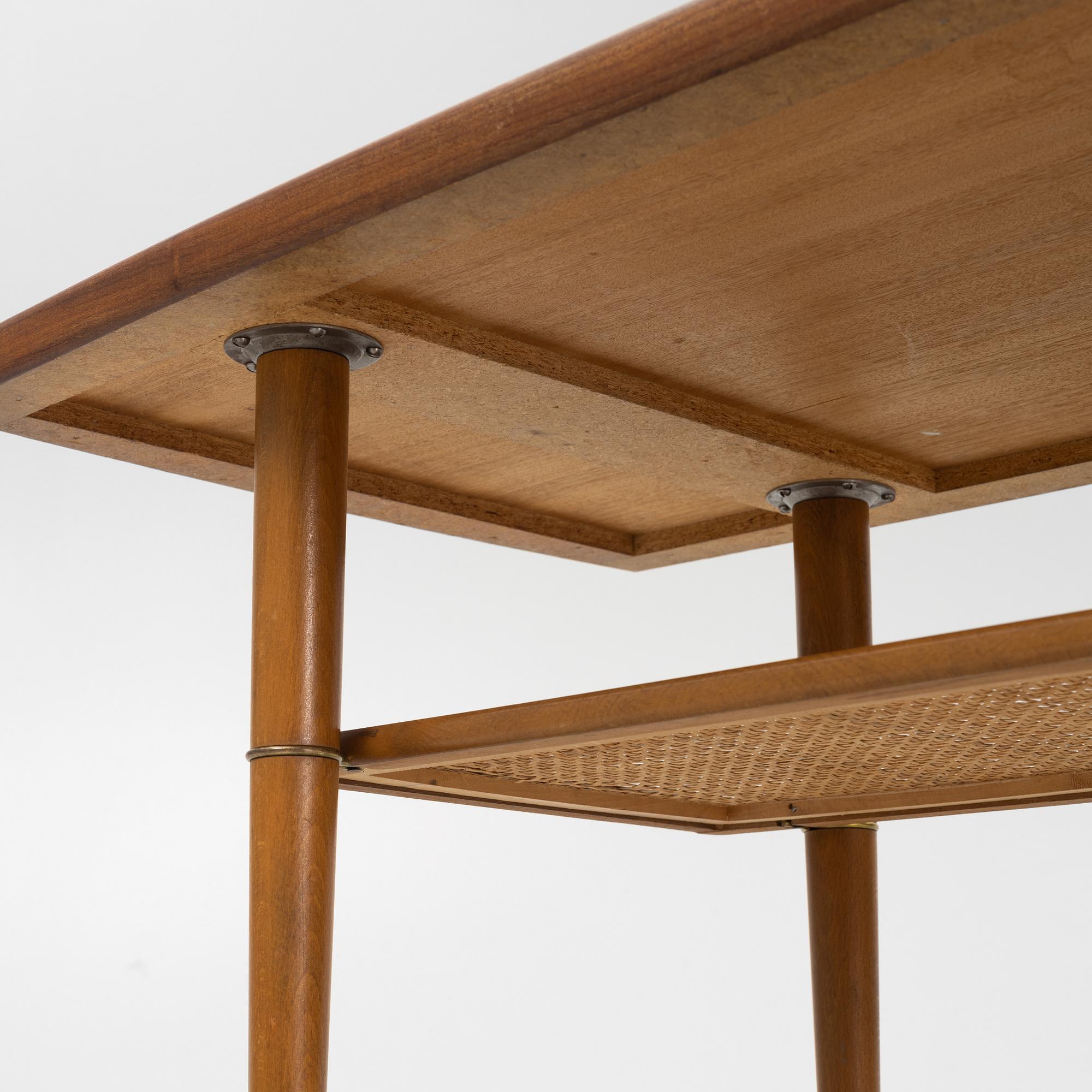 A 1960s teak coffee table.