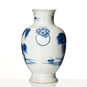 A blue and white bronze shaped vase with mythical creatures, Qing dynasty, 19th Century.