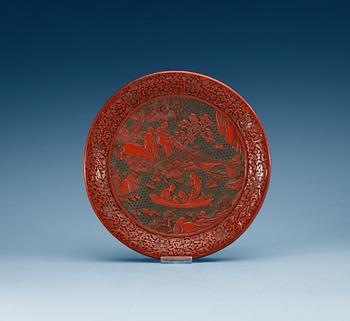 1332. A large red lacquer dish, Qing dynasty.