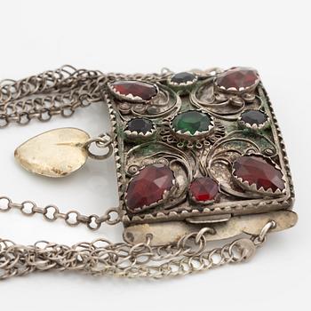 Folk costume jewellery, silver with glass stones.
