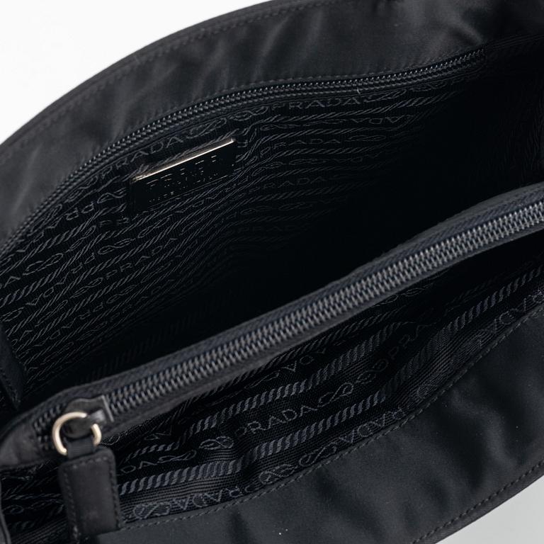 Prada, a black nylon handbag.
