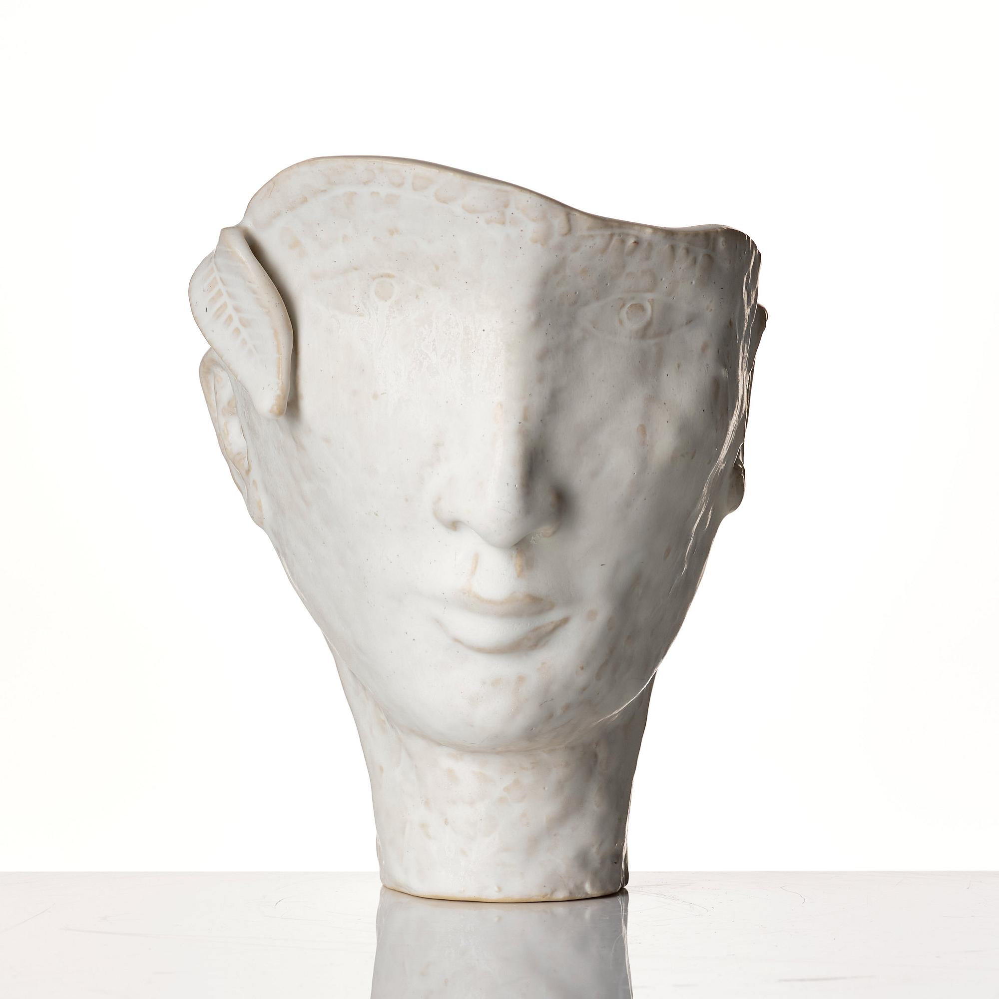 Stig Lindberg, a white glazed stoneware vase of a head, Gustavsberg Studio, probably 1940s.