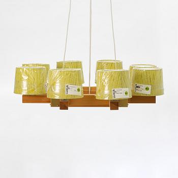 Uno & Östen Kristiansson, a pine wood ceiling lamp, Luxus, Vittsjö, Sweden.