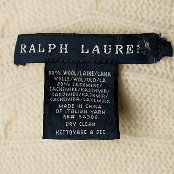 A white wool- and cashmere poncho by Ralph Lauren.