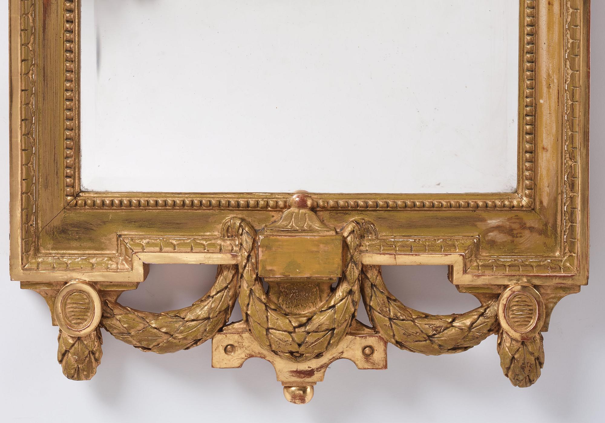 A Gustavian Giltwood mirror by J. Åkerblad (master in Stockholm 1758-1799).