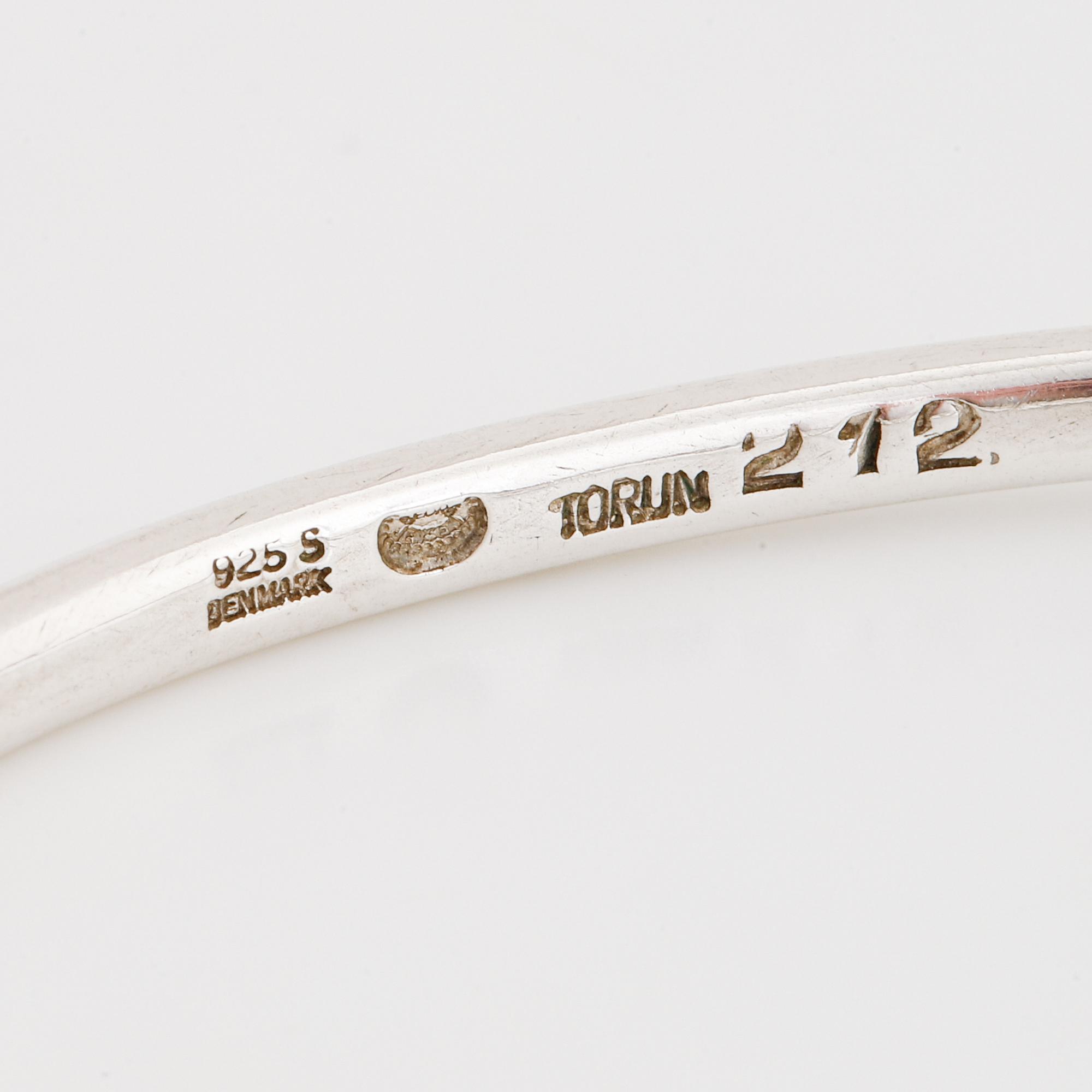 Vivianna Torun Bülow-Hübe, a sterling silver 212 bangle, Georg Jensen, Denmark.