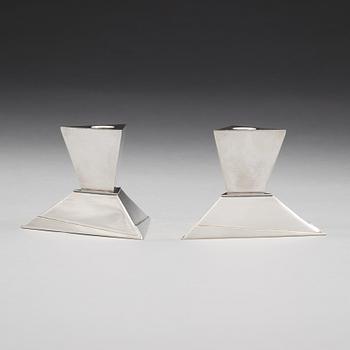 Elsa Tennhardt, A pair of Elsa Tennhardt silver plated candlesticks, E & J Bass Company, New York ca 1928.