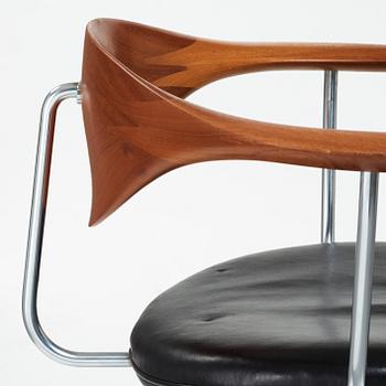 Hans J. Wegner, a "Swivel Chair" /JH502, executed by Johannes Hansen, Denmark 1960's.