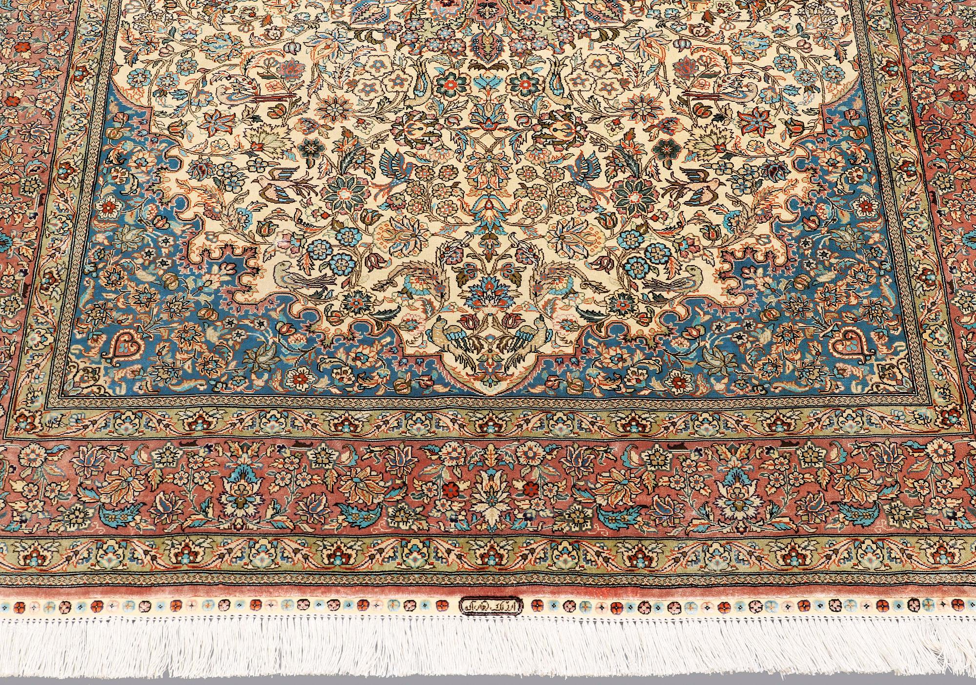 A rug, Figural Oriental silk,  signed, ca 175 x 125 cm.