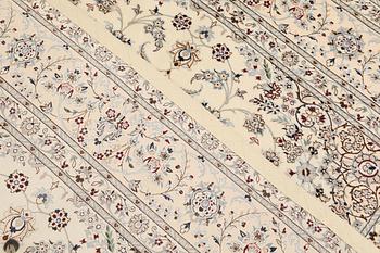 A Nain part silk carpet, c. 207 x 208 cm.