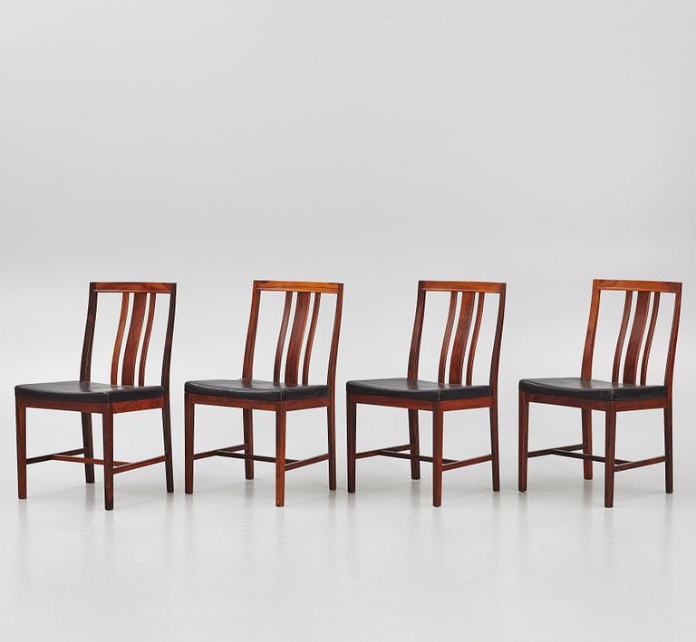 Bertil Fridhagen, a rosewood-veneered dining table with four chairs, BOdsfors, Sweden, 1960's.