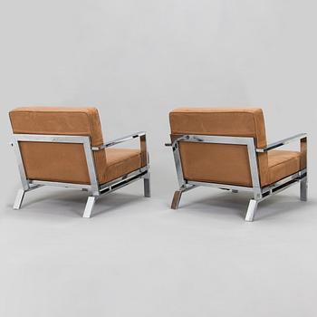 A pair of  21st century armchairs for Innovation.