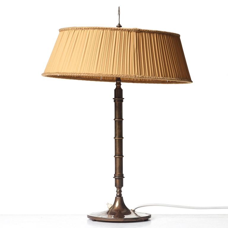 Harald Elof Notini, a Swedish Grace bronze table lamp for Böhlmarks 1930's.