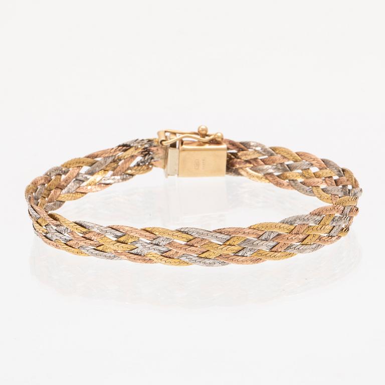 A 14K gold bracelet.