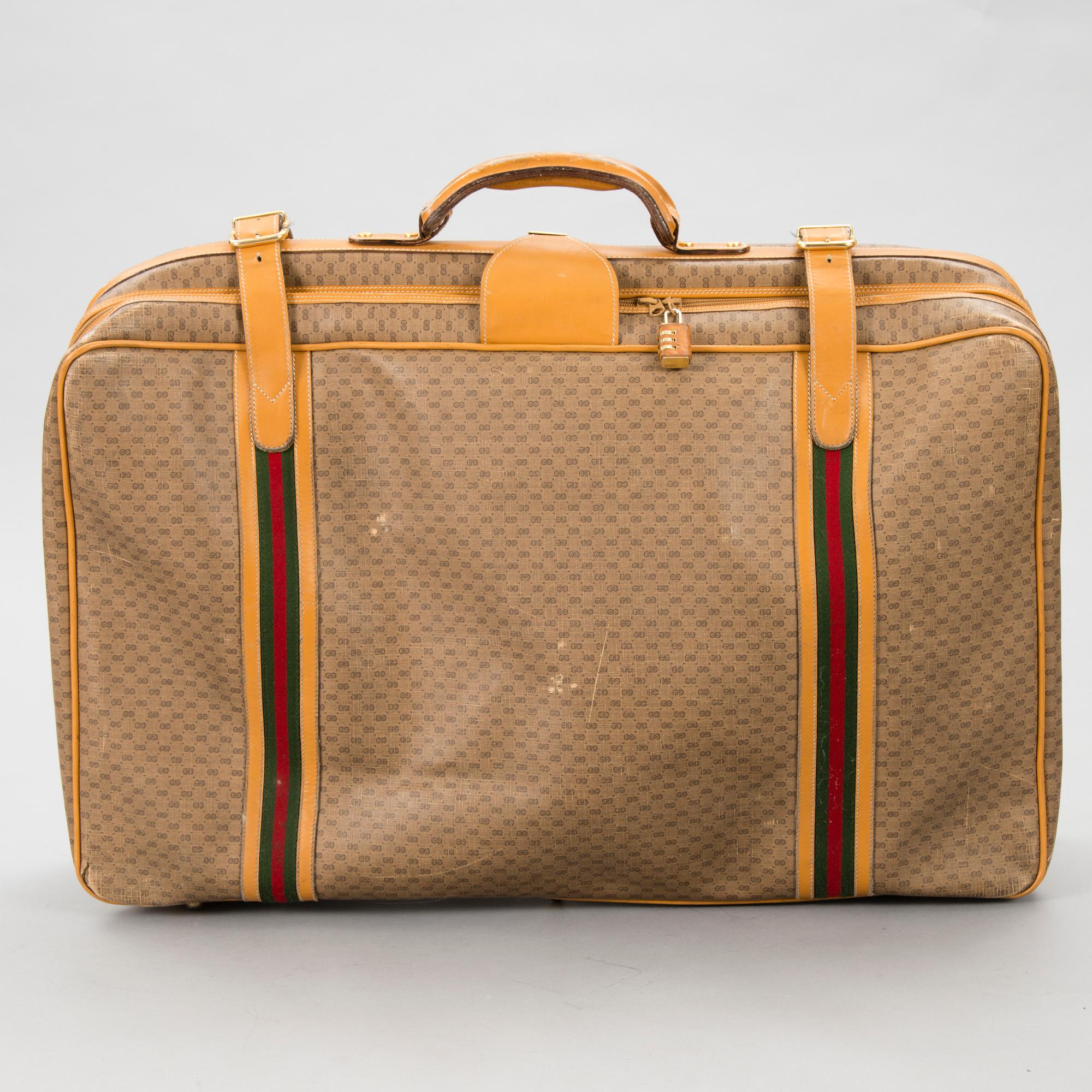 A Large Vintage Micro GG canvas Soft Suitcase.